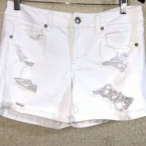 American Eagle Midi Distressed Shorts in White